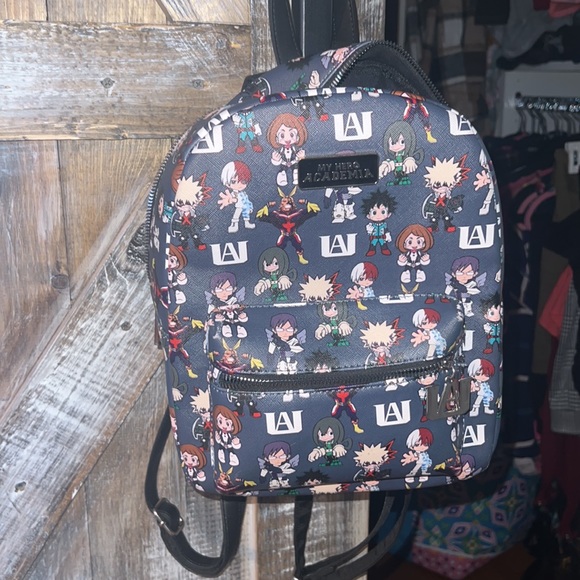 earidescent mini backpack Continuing the World's Most Magical Celebration with the new Loungefly  Earidescent Shimmer mini backpack! Now available at select @DisneyParks  stores at the Walt Disney World Resort! 